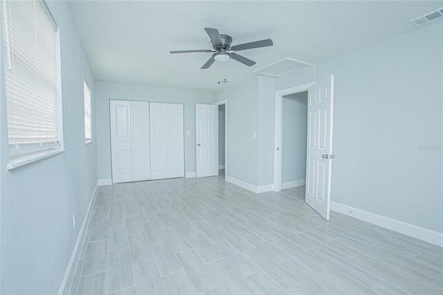 2501 Stratford Dr, Cocoa, FL 32926 - unfurnished bedroom with baseboards, a closet, a ceiling fan, and light wood finished floors