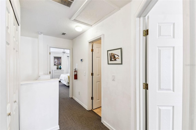 1180 S Beach Cir, Kissimmee, FL 34746 - hallway featuring carpet flooring and baseboards