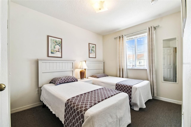 1180 S Beach Cir, Kissimmee, FL 34746 - carpeted bedroom with baseboards