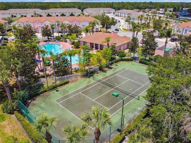 1180 S Beach Cir, Kissimmee, FL 34746 - view of tennis court featuring a residential view