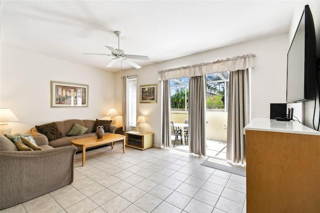 1180 S Beach Cir, Kissimmee, FL 34746 - living area with a ceiling fan and light tile patterned floors
