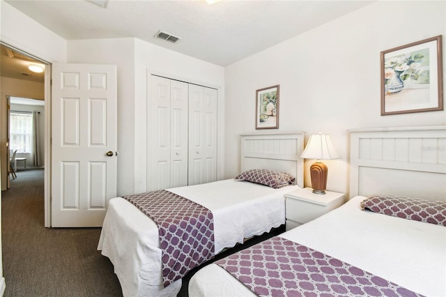 1180 S Beach Cir, Kissimmee, FL 34746 - bedroom featuring dark carpet and a closet