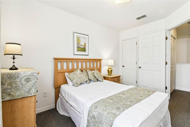 1180 S Beach Cir, Kissimmee, FL 34746 - carpeted bedroom featuring baseboards