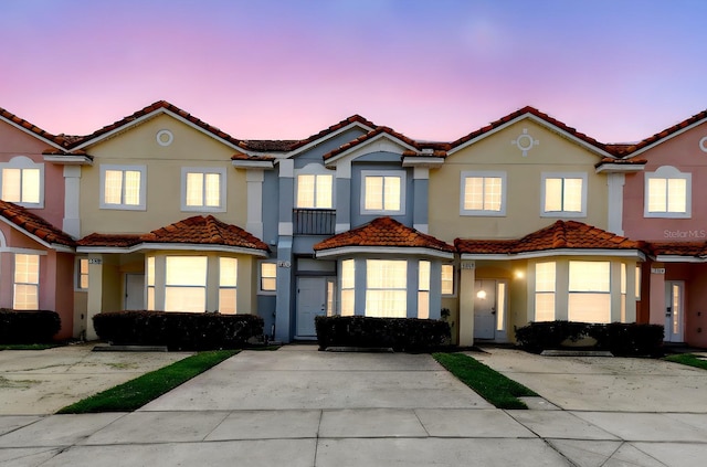 1180 S Beach Cir, Kissimmee, FL 34746 - multi unit property featuring a tile roof and stucco siding