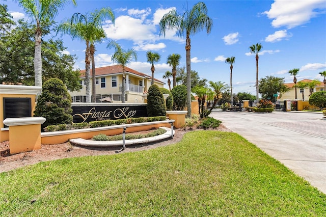 1180 S Beach Cir, Kissimmee, FL 34746 - community sign with a lawn