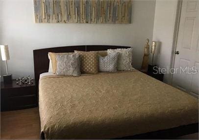 8973 Lee Vista Blvd Unit 2308, Orlando, FL 32829 - bedroom with wood finished floors