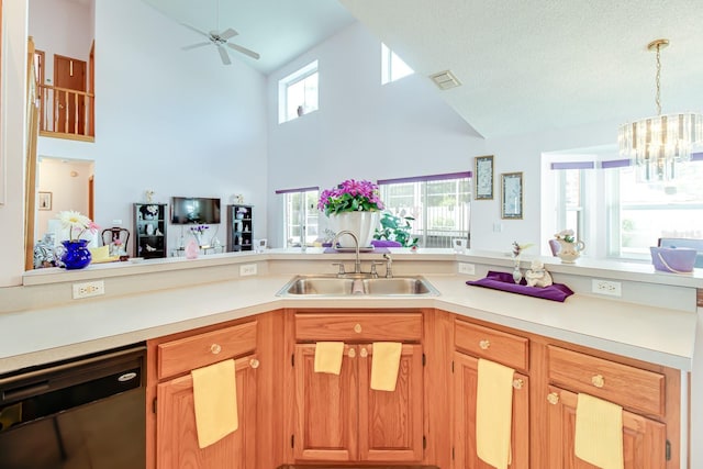 2712 Rolling Broak Dr, Orlando, FL 32837 - kitchen with visible vents, high vaulted ceiling, light countertops, a sink, and dishwasher