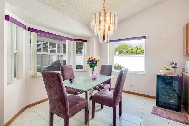 2712 Rolling Broak Dr, Orlando, FL 32837 - dining room with a notable chandelier, a textured ceiling, baseboards, lofted ceiling, and wine cooler