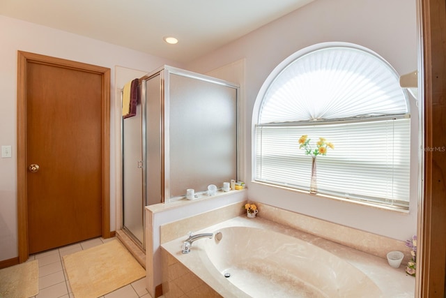2712 Rolling Broak Dr, Orlando, FL 32837 - bathroom featuring recessed lighting, tile patterned floors, a bath, and a stall shower