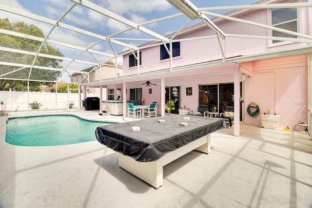 2712 Rolling Broak Dr, Orlando, FL 32837 - view of swimming pool with ceiling fan, a fenced in pool, a patio area, a jacuzzi, and glass enclosure
