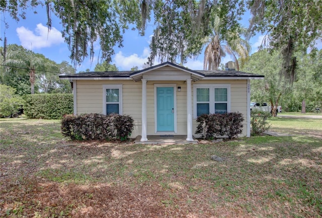 view of front of home with a front yard