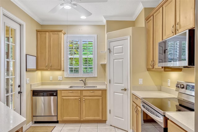kitchen with a sink, light brown cabinets, light countertops, a ceiling fan, and stainless steel appliances