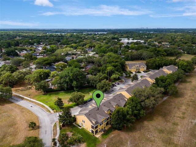 birds eye view of property with a residential view