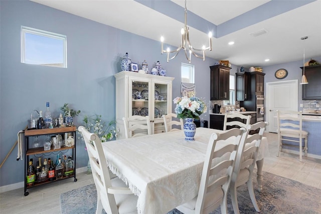 dining area featuring a notable chandelier, recessed lighting, baseboards, light wood-type flooring, and visible vents