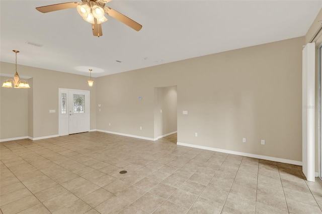 26807 Bull Run, Leesburg, FL 34748 - unfurnished living room featuring light tile patterned floors, ceiling fan, a chandelier, and baseboards