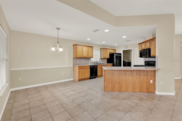 26807 Bull Run, Leesburg, FL 34748 - kitchen with black appliances, backsplash, light tile patterned floors, a sink, and light countertops