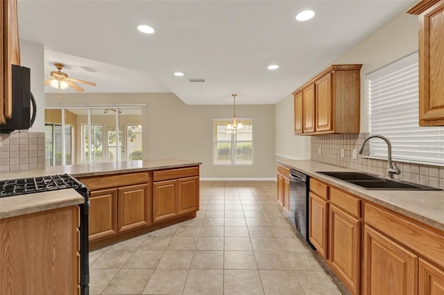 26807 Bull Run, Leesburg, FL 34748 - kitchen featuring a sink, black range with gas stovetop, dishwashing machine, decorative backsplash, and recessed lighting