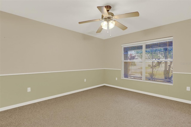 26807 Bull Run, Leesburg, FL 34748 - empty room featuring carpet, ceiling fan, and baseboards