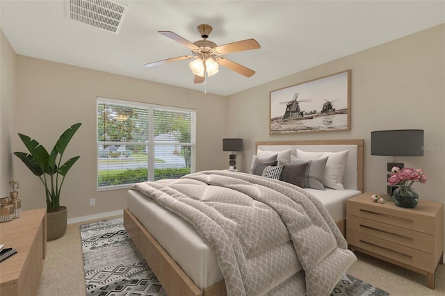 26807 Bull Run, Leesburg, FL 34748 - bedroom with light carpet, baseboards, and a ceiling fan