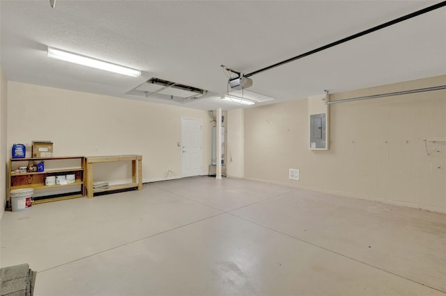 26807 Bull Run, Leesburg, FL 34748 - garage with a garage door opener, electric panel, gas water heater, and concrete block wall