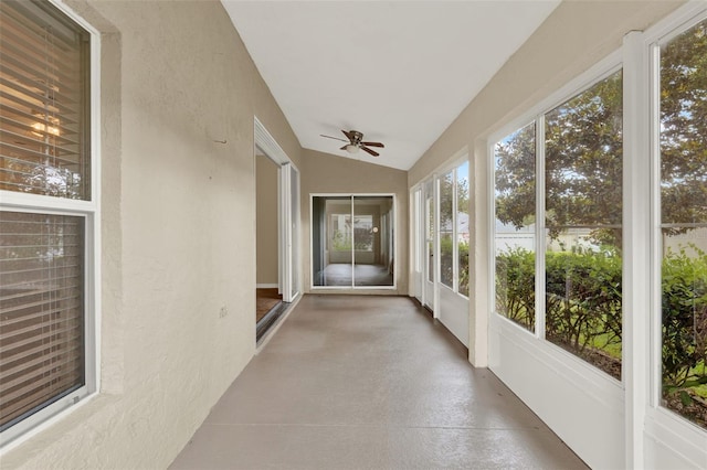 26807 Bull Run, Leesburg, FL 34748 - unfurnished sunroom featuring vaulted ceiling and concrete floors