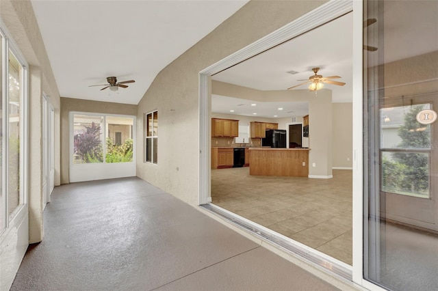 26807 Bull Run, Leesburg, FL 34748 - unfurnished sunroom featuring vaulted ceiling