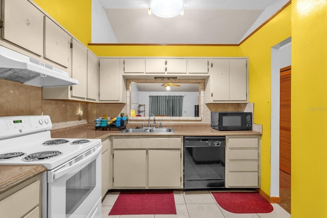 kitchen with decorative backsplash, a sink, light tile patterned floors, black appliances, and under cabinet range hood