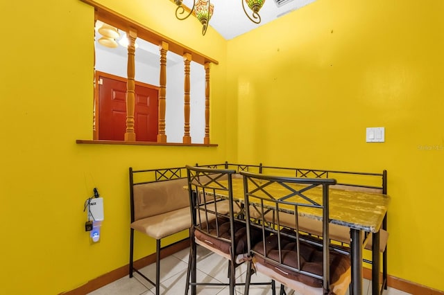 interior space featuring baseboards