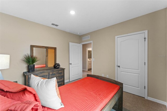 bedroom featuring recessed lighting, baseboards, visible vents, and carpet