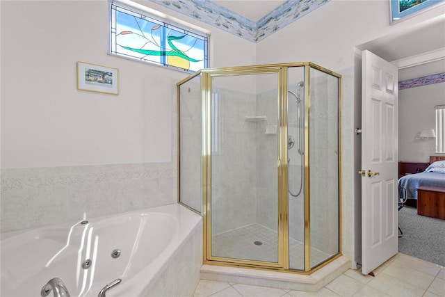 ensuite bathroom featuring a jetted tub, tile patterned flooring, a shower stall, and connected bathroom
