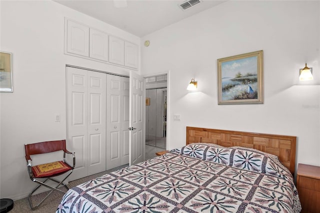 bedroom featuring carpet floors, a ceiling fan, a closet, and visible vents