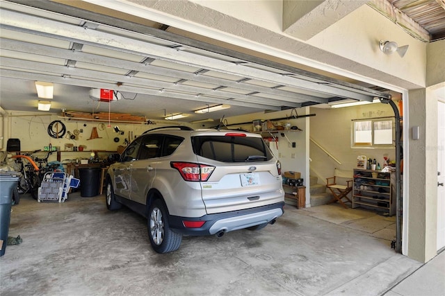 garage featuring a garage door opener