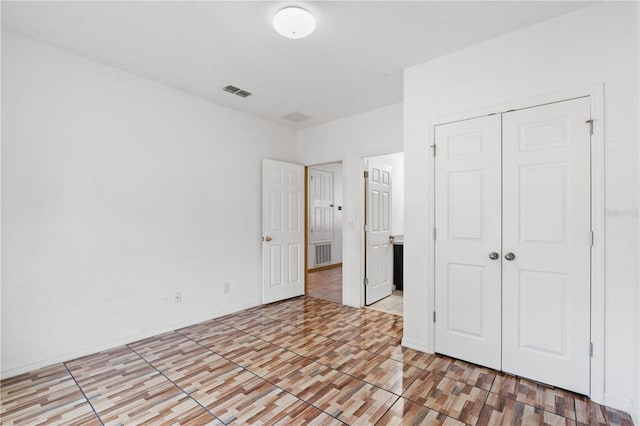 3345 Reedy Glen Dr, Kissimmee, FL 34758 - unfurnished bedroom with visible vents and a closet