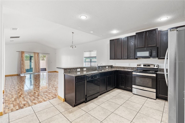 3345 Reedy Glen Dr, Kissimmee, FL 34758 - kitchen with a peninsula, lofted ceiling, light tile patterned flooring, a sink, and black appliances
