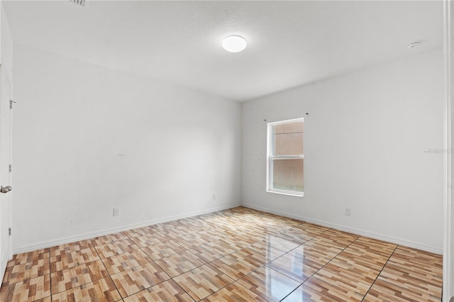 3345 Reedy Glen Dr, Kissimmee, FL 34758 - empty room with baseboards and wood finished floors