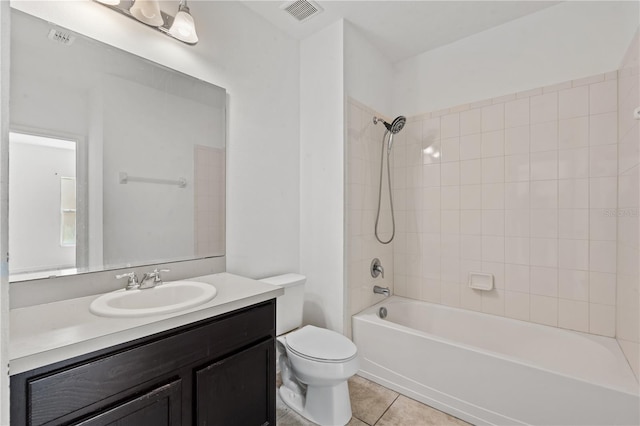 3345 Reedy Glen Dr, Kissimmee, FL 34758 - bathroom with tile patterned floors, vanity, toilet, and visible vents