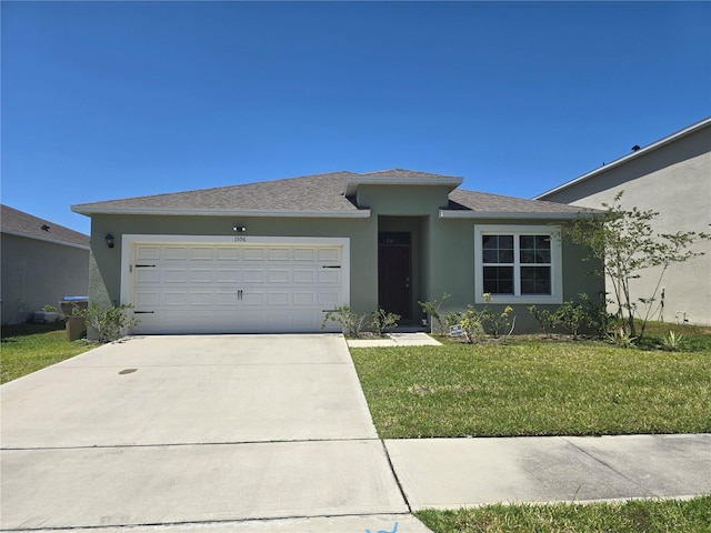 ranch-style house with an attached garage, driveway, a front lawn, and stucco siding