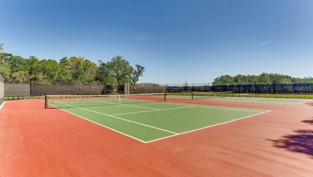 view of sport court with fence and community basketball court