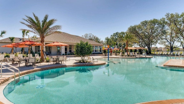 pool featuring a patio area