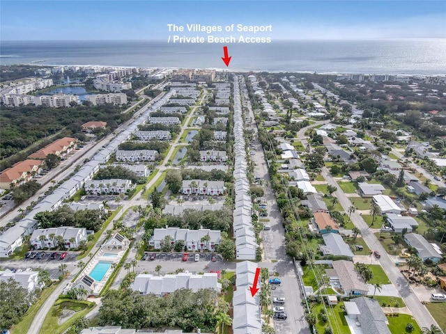 136 Beach Park Ln Unit 35, Cape Canaveral, FL 32920 - aerial view of property and surrounding area with a nearby body of water and nearby suburban area