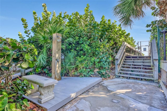 136 Beach Park Ln Unit 35, Cape Canaveral, FL 32920 - view of patio with stairway and a wooden deck