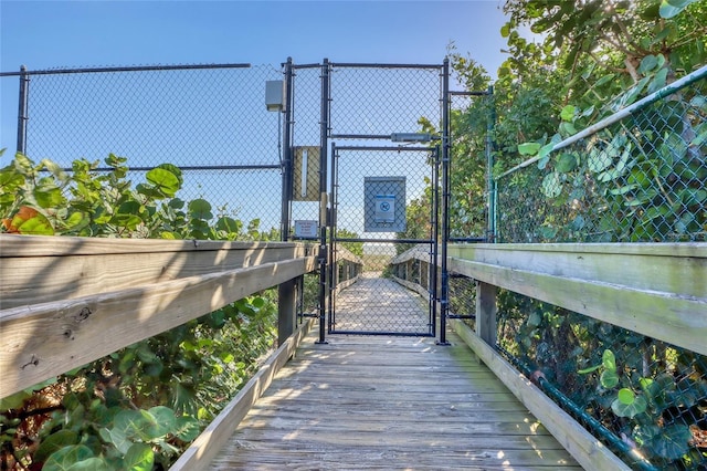 136 Beach Park Ln Unit 35, Cape Canaveral, FL 32920 - view of tennis court with a gate