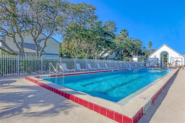136 Beach Park Ln Unit 35, Cape Canaveral, FL 32920 - community pool with a patio area