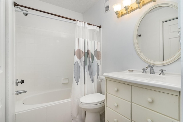136 Beach Park Ln Unit 35, Cape Canaveral, FL 32920 - bathroom featuring shower / bath combo, toilet, vanity, and a textured ceiling