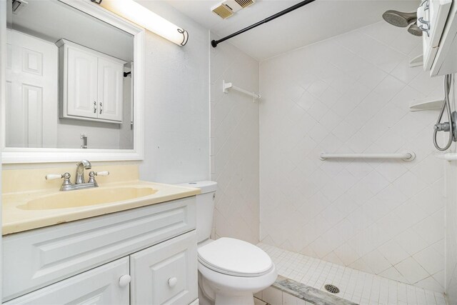 136 Beach Park Ln Unit 35, Cape Canaveral, FL 32920 - full bathroom with a shower stall, toilet, and vanity