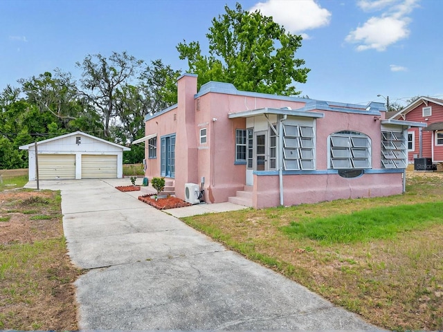 16 E Orange St, Davenport, FL 33837 - bungalow-style home with a garage, stucco siding, a chimney, central air condition unit, and an outdoor structure