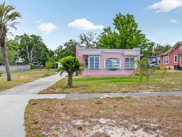 16 E Orange St, Davenport, FL 33837 - bungalow-style home with stucco siding