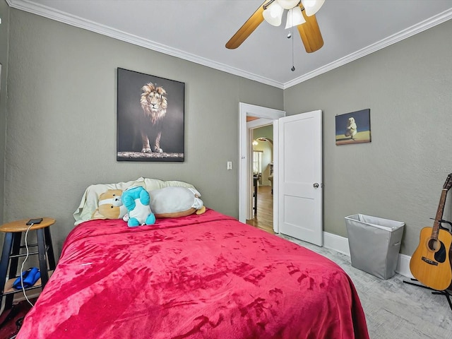 16 E Orange St, Davenport, FL 33837 - bedroom featuring baseboards, ornamental molding, and a ceiling fan