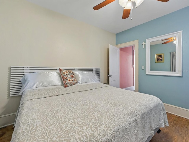 16 E Orange St, Davenport, FL 33837 - bedroom with baseboards, ceiling fan, and wood finished floors