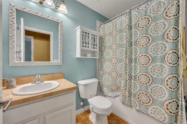 5102 Monticello Heights Ln, Oviedo, FL 32765 - bathroom featuring vanity, toilet, and a textured ceiling